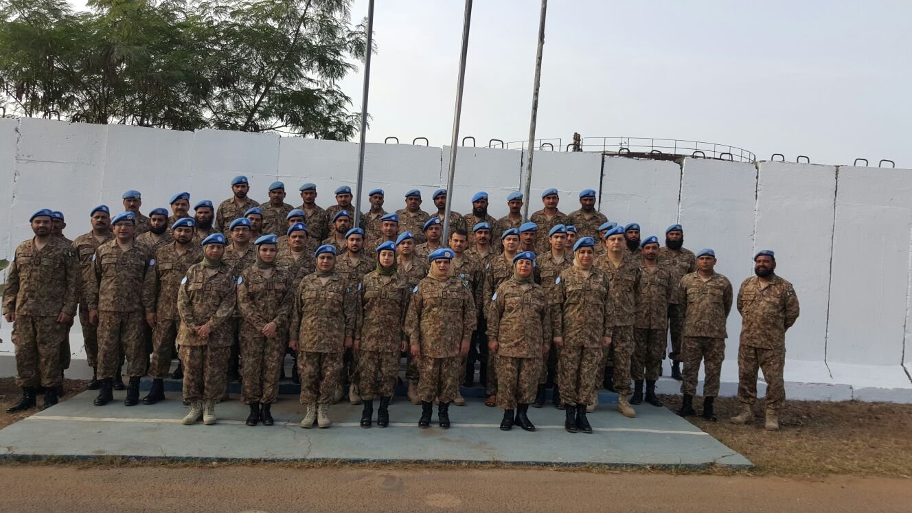 Dr. Urooj Hina standing with Pakistan Army medical officers during United Nations international medical service deployment