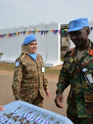 Pakistani female military officer Dr. Urooj Hina at United Nations medal parade ceremony with Ghana Army officer.